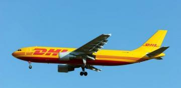 DHL suspends shipments to US over $800 