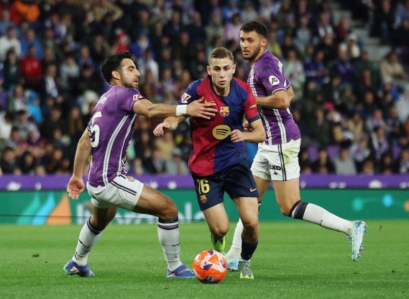 Barca keep title bid on track with 2-1 comeback win at Valladolid 