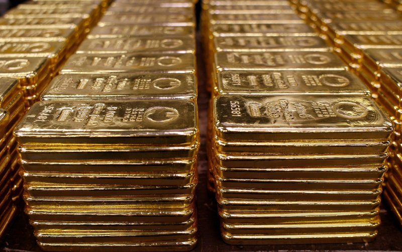 Gold slips as markets weigh US inflation data, easing trade tensions