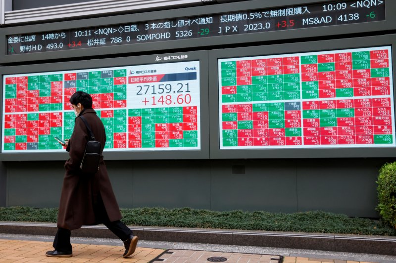 Tokyo stocks slide on worries over US credit downgrade