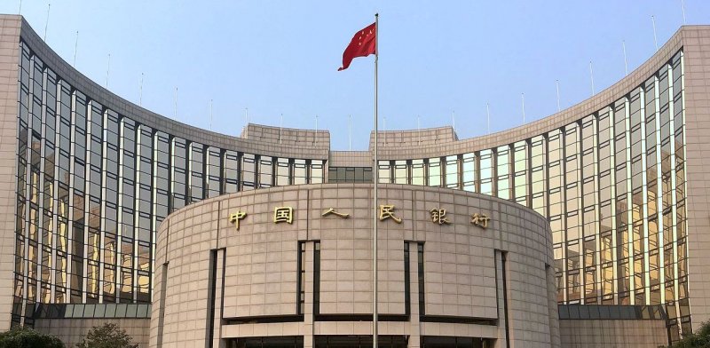 China cuts benchmark lending rates for first time in seven months