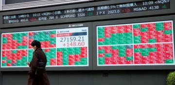 Tokyo stocks slide on worries over US credit downgrade