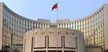 China cuts benchmark lending rates for first time in seven months