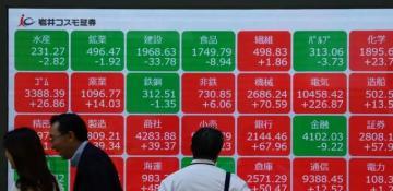 Tokyo stocks edge up over Wall Street gains 