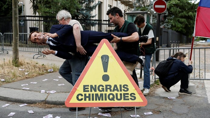 Macron's wax statue stolen from Paris museum, report says