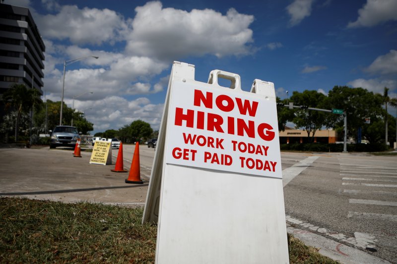 US job growth slows slightly in May but beats expectations