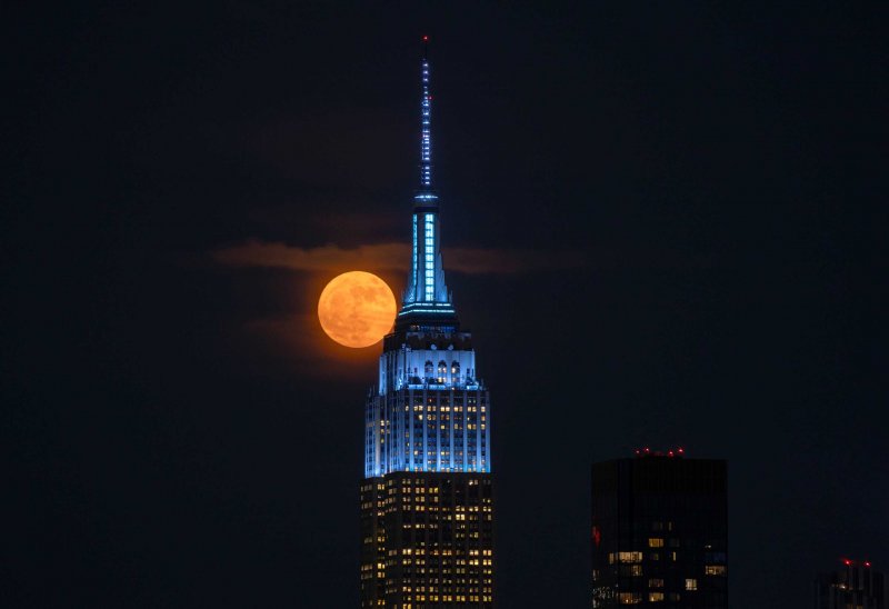 News about -  In Photos:  Strawberry Moon lights up the sky