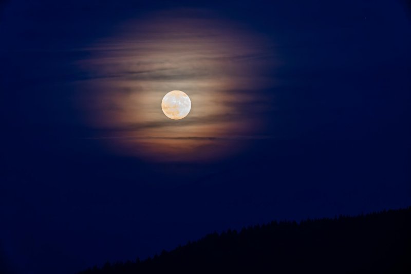 News about -  In Photos:  Strawberry Moon lights up the sky