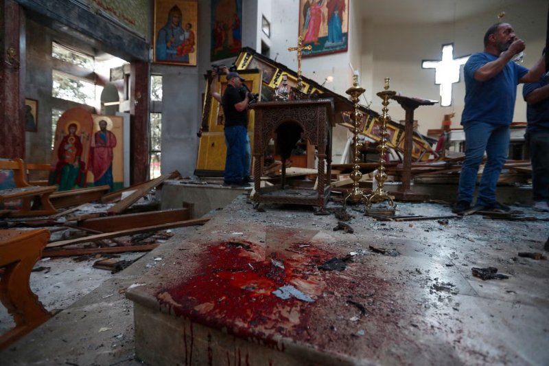 Suicide blast during Sunday mass at Damascus church kills at least 19  -VIDEO 