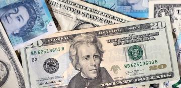 Dollar edges down as trade tensions simmer ahead of jobs data 