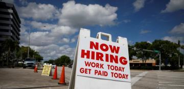 US job growth slows slightly in May but beats expectations