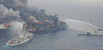 Indian coastguard battles fire on container ship