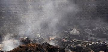 Charred bodies, shattered lives after gunmen kill 100 in Nigeria 