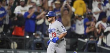 Dodgers power past Rockies with Muncy’s grand slam