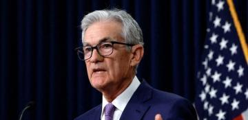 Fed keeps rates steady, but sees fewer cuts next year on stagflation concerns 