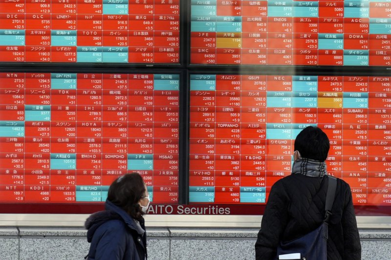Asian markets mixed as Wall Street hits record high; Chinese stocks surge