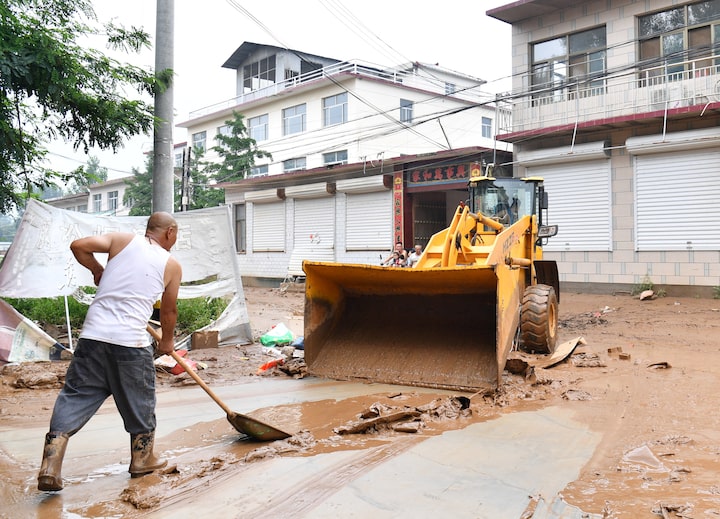 Four dead, eight missing as torrential rain triggers floods and landslides in Northern China