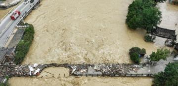 At least 9 dead, thousands displaced as heavy floods hit China