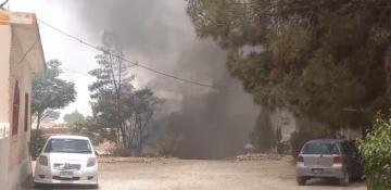 Militants attack police station, torch banks, kill teenager in southwest Pakistan