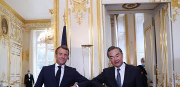 Macron, Wang Yi hold high-level talks in Paris, emphasize cooperation over confrontation