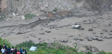 At least 9 dead, 20 missing as monsoon floods sweep away Nepal-China bridge