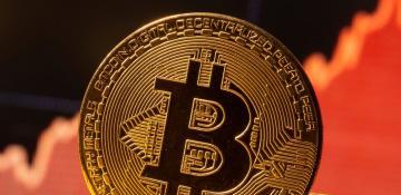 Bitcoin hits new record high amid growing demand