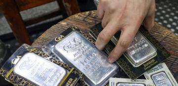 Silver nears 14-year high as investors look beyond expensive gold