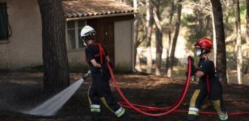 Hundreds of firefighters battle wildfire near Marseille amid improving conditions