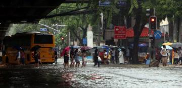 Floods in Philippines displace thousands as torrential rains continue