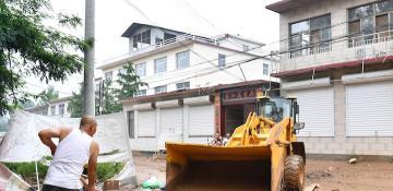 Four dead, eight missing as torrential rain triggers floods and landslides in Northern China