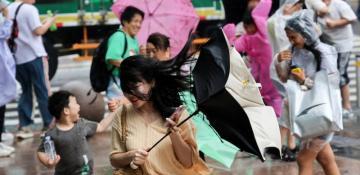 Shanghai relocates 280,000 residents, cancels flights as Tropical Storm Co-May hits