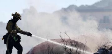 Firefighters battle three wildfires East of Los Angeles; thousands briefly evacuated