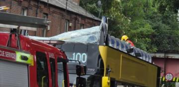 Bus driver arrested after 20 injured in Manchester double-decker crash