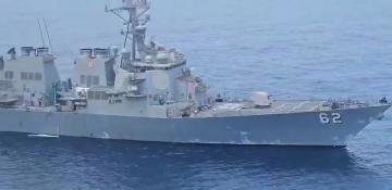 Iranian helicopter confronts US warship near territorial waters in Gulf of Oman -  VIDEO 