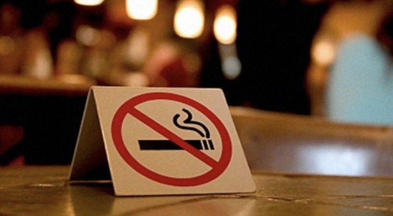 France bans smoking in most public areas