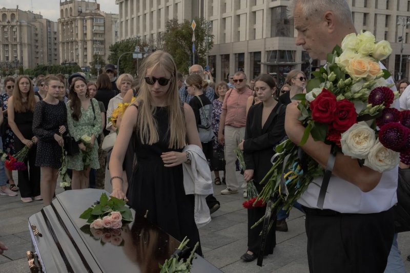 Kyiv holds farewell for journalist tortured and killed in Russian captivity