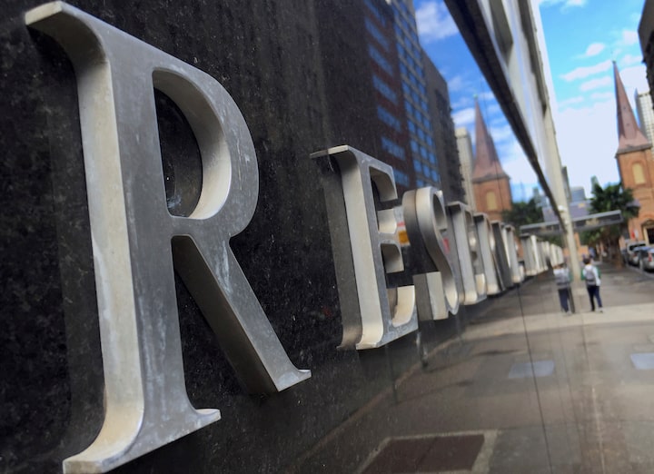 Australia Central Bank cuts rates to two-year low, signals caution on further easing