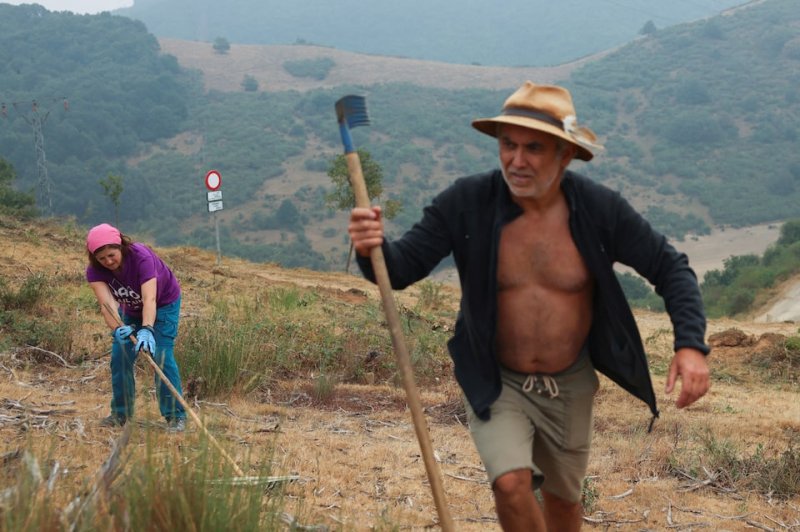 Wildfires in Spain stabilising as cooler weather brings hope