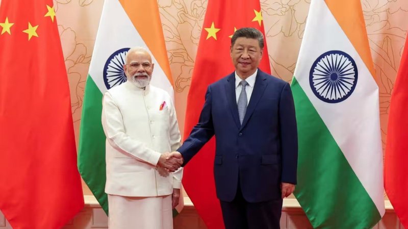 Xi tells Modi that China and India must “stand together” as U.S. tariffs take effect
