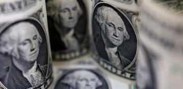 Dollar slips after U.S. job growth slows in July