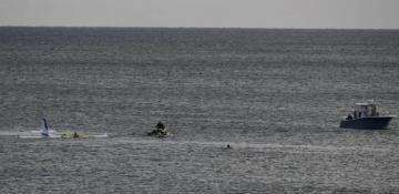 NC pilot survives ocean crash landing near Oak Island pier -  VIDEO 