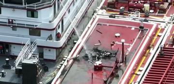 Helicopter crashes into barge on Mississippi River, killing two