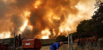Wildfires rage across Southern Europe amid record heat