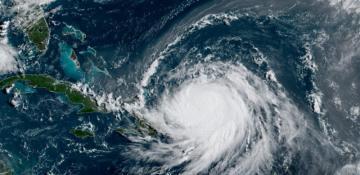 Hurricane Erin hits Caribbean islands, threatens U.S. coast
