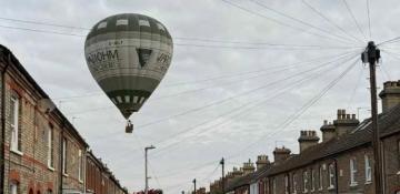 Hot air balloon makes unexpected landing on Bedford Street -  VIDEO 