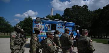 US National Guard troops in Washington, DC, begin carrying firearms