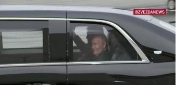 Putin joins Trump in his presidential limo as they head to meeting 