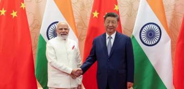 Xi tells Modi that China and India must “stand together” as U.S. tariffs take effect