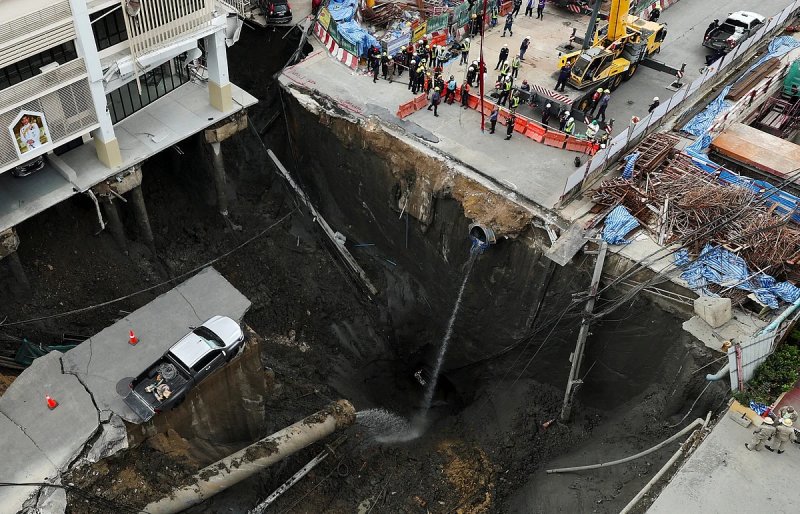 Massive sinkhole in Bangkok street prompts evacuations