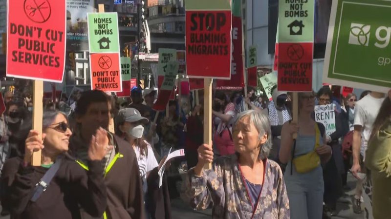 Thousands rally in Toronto to 'draw the line' against PM Carney agenda 